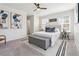 Spacious main bedroom with two windows, ceiling fan and stylish decor at 260 Westview Sw Pl, Atlanta, GA 30314