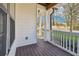 Inviting front porch with wooden floors and railings, perfect for relaxing and enjoying the outdoors at 260 Westview Sw Pl, Atlanta, GA 30314