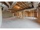Unfinished basement with exposed ductwork and framed walls offers customization and expansion possibilities at 2801 Univeter Rd, Canton, GA 30115