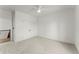 Bedroom with carpet, white trim and view to the staircase to the first floor at 2801 Univeter Rd, Canton, GA 30115