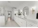 Bright main bathroom with dual vanity, marble countertops, and modern lighting at 2801 Univeter Rd, Canton, GA 30115