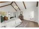 Spacious main bedroom with vaulted ceilings, exposed beams, and a cozy design at 2801 Univeter Rd, Canton, GA 30115
