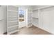 Large walk-in closet featuring built-in shelving and ample storage space at 2801 Univeter Rd, Canton, GA 30115
