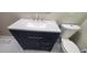 Bathroom featuring a modern vanity with a white countertop and a toilet at 3879 Artist Vw, Decatur, GA 30034
