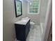 Modern bathroom with new vanity, mirror, tile floor, and shower-tub combination at 3879 Artist Vw, Decatur, GA 30034