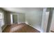 Bright living room with wood floors and doorway to another room at 3879 Artist Vw, Decatur, GA 30034