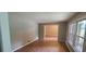 Well-lit living room with hardwood floors and view to outside at 3879 Artist Vw, Decatur, GA 30034