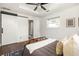 Bright bedroom with a sliding barn door to bathroom and a comfortable bed at 1244 Lorenzo Sw Dr, Atlanta, GA 30310