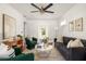 Comfortable living area with neutral tones, ceiling fan, and ample natural light at 1244 Lorenzo Sw Dr, Atlanta, GA 30310