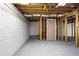 Unfinished basement space with painted walls and open ceiling, ready to be customized at 1350 Overlook Se Cv, Smyrna, GA 30080