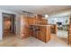 The unique bar area has stone countertops and comfortable seating making it the perfect spot to relax at 3398 Lori Ln, Atlanta, GA 30340