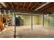 Unfinished basement space with exposed ceiling, and concrete floor at 3398 Lori Ln, Atlanta, GA 30340