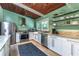 Bright and airy kitchen with stainless steel appliances, granite countertops, and a farmhouse sink at 3398 Lori Ln, Atlanta, GA 30340
