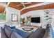 Open-concept living room with hardwood floors, vaulted ceiling, and modern decor at 3398 Lori Ln, Atlanta, GA 30340