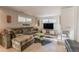 Comfortable living room with a cozy sofa, brick fireplace, and bright windows at 3398 Lori Ln, Atlanta, GA 30340