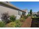 Beautiful backyard with manicured landscaping and water feature at 3470 Serenade Nw Commons, Kennesaw, GA 30152