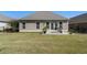 Well-manicured lawn and cozy patio area create a private outdoor retreat at 3470 Serenade Nw Commons, Kennesaw, GA 30152