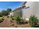 Well-maintained backyard landscaping with lush plants and flowerbeds at 3470 Serenade Nw Commons, Kennesaw, GA 30152