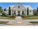 Charming community clubhouse with rocking chairs, landscaping, and inviting entrance at 3470 Serenade Nw Commons, Kennesaw, GA 30152