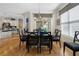 Elegant dining room with hardwood floors, stylish chandelier, and views of the kitchen at 3470 Serenade Nw Commons, Kennesaw, GA 30152