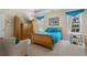 Bright main bedroom with tray ceilings, carpet, and furnishings at 3470 Serenade Nw Commons, Kennesaw, GA 30152