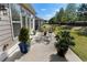 Outdoor patio with seating area and potted plants creates a welcoming and relaxing atmosphere at 3470 Serenade Nw Commons, Kennesaw, GA 30152