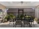 Screened patio with an outdoor dining area and comfortable seating at 3470 Serenade Nw Commons, Kennesaw, GA 30152