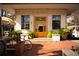 An inviting building exterior with a striking yellow door and beautiful landscaping on a brick-paved entrance at 185 Marion # A, Atlanta, GA 30307