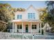 Charming two-story home featuring a classic white picket fence and inviting front porch at 185 Marion # A, Atlanta, GA 30307