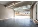 Spacious two car garage with epoxy flooring and an automatic door opener. View of backyard at 185 Marion # A, Atlanta, GA 30307