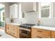 Contemporary kitchen with sleek appliances, quartz countertops, and custom cabinetry at 185 Marion # A, Atlanta, GA 30307