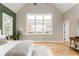 Bright bedroom offers lots of natural light, vaulted ceiling, and warm hardwood floors at 185 Marion # A, Atlanta, GA 30307