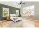 Airy main bedroom with vaulted ceiling, a ceiling fan and lots of natural light at 185 Marion # A, Atlanta, GA 30307