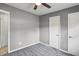 Cozy bedroom with soft carpet, two doors, and neutral paint at 2235 Chamois Ct, Decatur, GA 30035