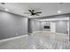 Bright living room featuring sleek floors, modern lighting, and an electric fireplace at 2235 Chamois Ct, Decatur, GA 30035