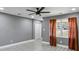 Bright living room featuring sleek floors, modern lighting, and red curtains at 2235 Chamois Ct, Decatur, GA 30035