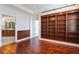 Bedroom with beautiful hardwood floors and custom wood bookcase at 2881 Peachtree Ne Rd # 704, Atlanta, GA 30305