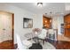 Charming dining area with round glass table next to modern kitchen with stainless steel appliances at 2881 Peachtree Ne Rd # 704, Atlanta, GA 30305