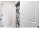 A stacked washer and dryer is conveniently tucked into a closet at 2881 Peachtree Ne Rd # 704, Atlanta, GA 30305