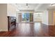 Spacious living room featuring hardwood floors, fireplace, and large windows for ample natural light at 2881 Peachtree Ne Rd # 704, Atlanta, GA 30305