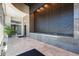 Elegant lobby featuring a stone wall water feature, creating a sophisticated and inviting atmosphere at 2881 Peachtree Ne Rd # 704, Atlanta, GA 30305
