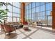 Bright lobby featuring high ceilings, expansive windows, and comfortable seating areas at 2881 Peachtree Ne Rd # 704, Atlanta, GA 30305