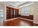 Comfortable office shows a large bookshelf and lots of natural light. Great for working from home at 2881 Peachtree Ne Rd # 704, Atlanta, GA 30305