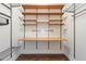 Customizable walk-in closet with adjustable shelves and drawers, offering versatile storage solutions for all your needs at 2881 Peachtree Ne Rd # 704, Atlanta, GA 30305