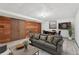 Basement with paneled wall, dart board, and living area at 357 Forest Lake Rd, Lawrenceville, GA 30046