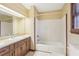 Bathroom featuring a shower and tub combo, single sink, and vanity at 357 Forest Lake Rd, Lawrenceville, GA 30046