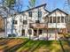 View of backyard featuring a raised deck and screened in porch perfect for outdoor living and entertaining at 4013 Brenteresa Ct, Snellville, GA 30039