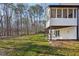 Exterior backyard view of the property with a screened-in porch, deck, and patio at 4013 Brenteresa Ct, Snellville, GA 30039