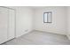 Neutral bedroom featuring wood-look flooring and closet for ample storage at 4013 Brenteresa Ct, Snellville, GA 30039