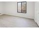 Bedroom features hardwood floors, white walls, and a large window at 4013 Brenteresa Ct, Snellville, GA 30039